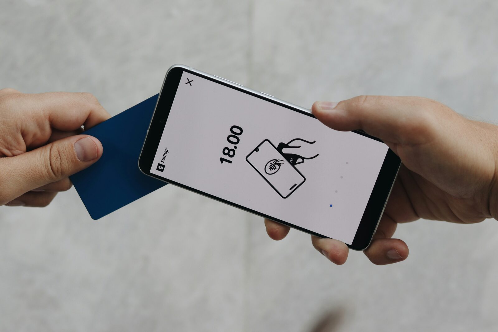 Hand holding a smartphone